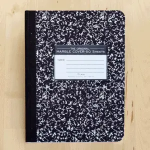 A notebook with illustrated stickers.