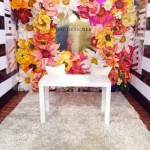oversized-paper-flowers-as-a-backdrop