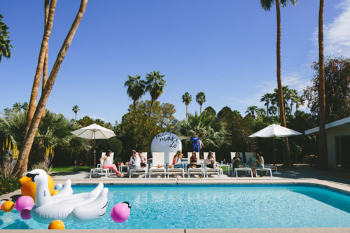 pool in Palm Springs with blow up swan