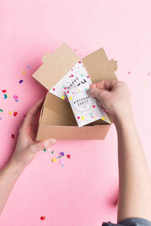 send a birthday party kit in a cake box