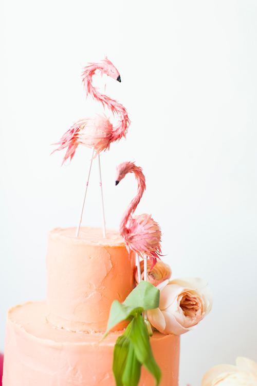 Flamingo cake toppers from BHLDN. Wedding cake by Tess Comrie of Le Loup. Photo by Jessica Peterson.
