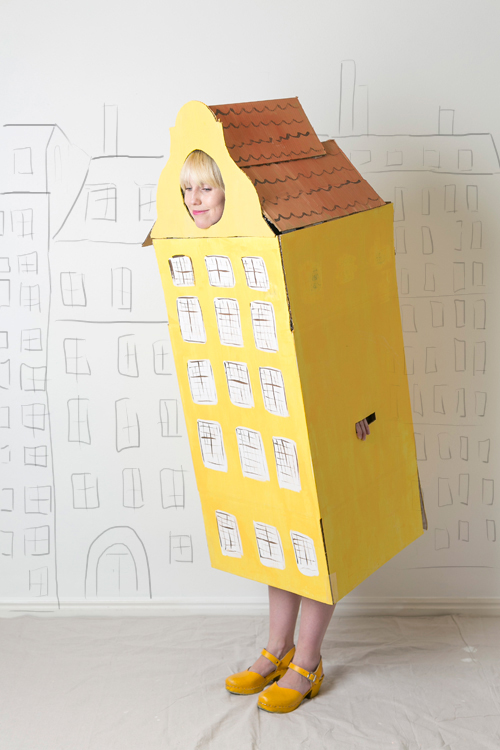 Row house Halloween costume made from a cardboard box