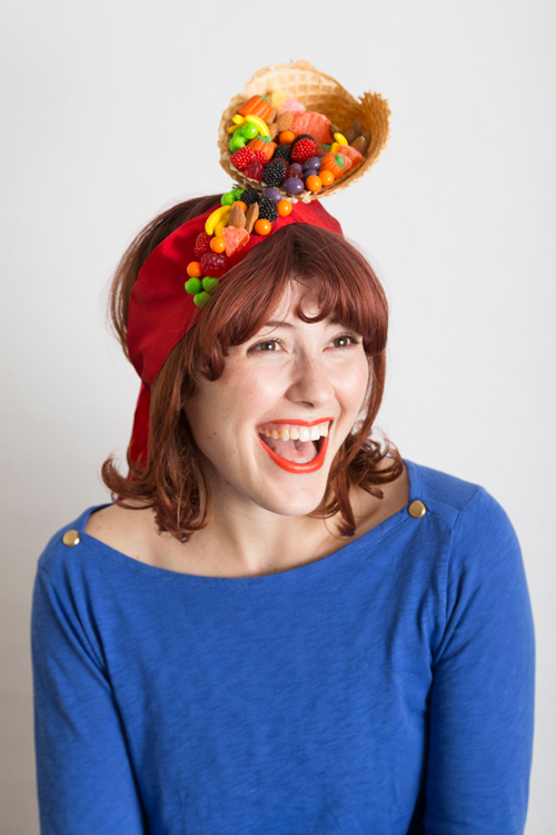 Start a new tradition of making hats for each other to wear on Thanksgiving like this candy cornucopia fascinator.