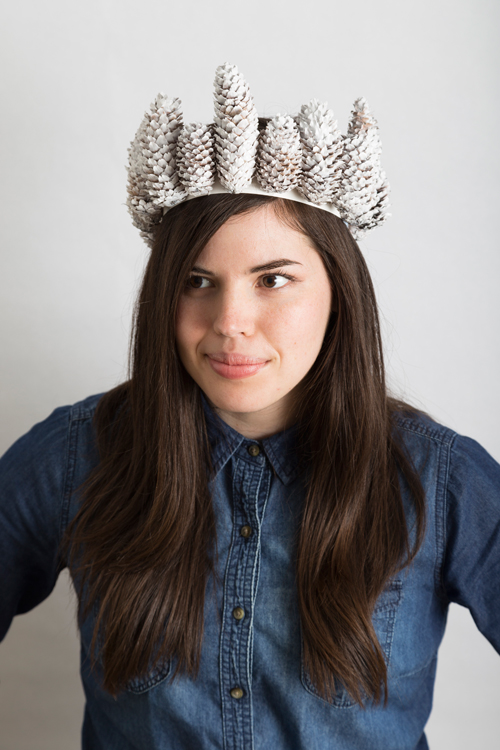 Start a new tradition of making hats for each other to wear on Thanksgiving like this pinecone crown.