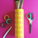 Make an office organizer from recycled canisters and Scotch tape