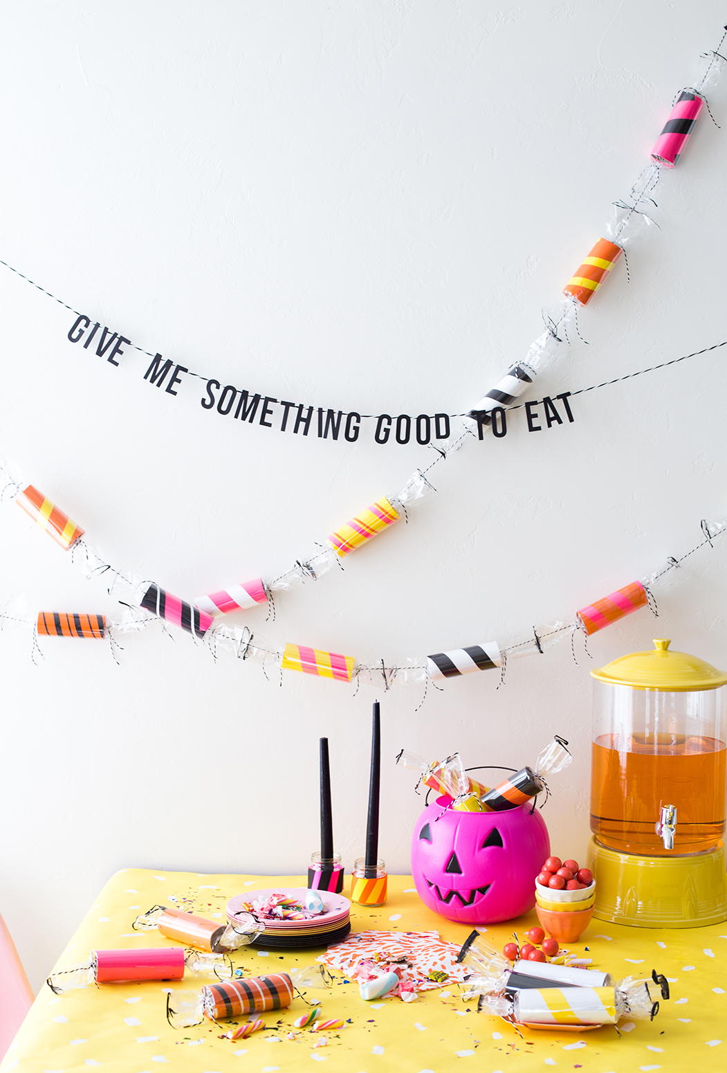 Toilet paper roll candy garland for Halloween #colorizeyourparty with Astrobrights