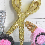 Throw a hair party with some festive pinatas!