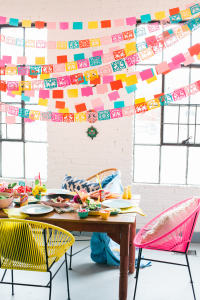 Cinco de Mayo Dinner party with wayfair chairs, joss and main dinnerware, and papel picado