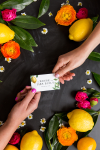 lars business card with lemons and blooms