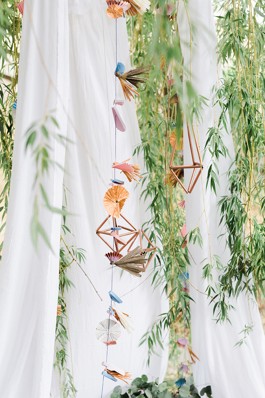 geometric copper hangings with straws