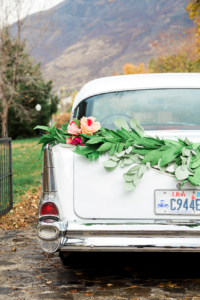 DIY paper garland swag for wedding get away car