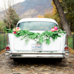 DIY paper garland swag for wedding get away car