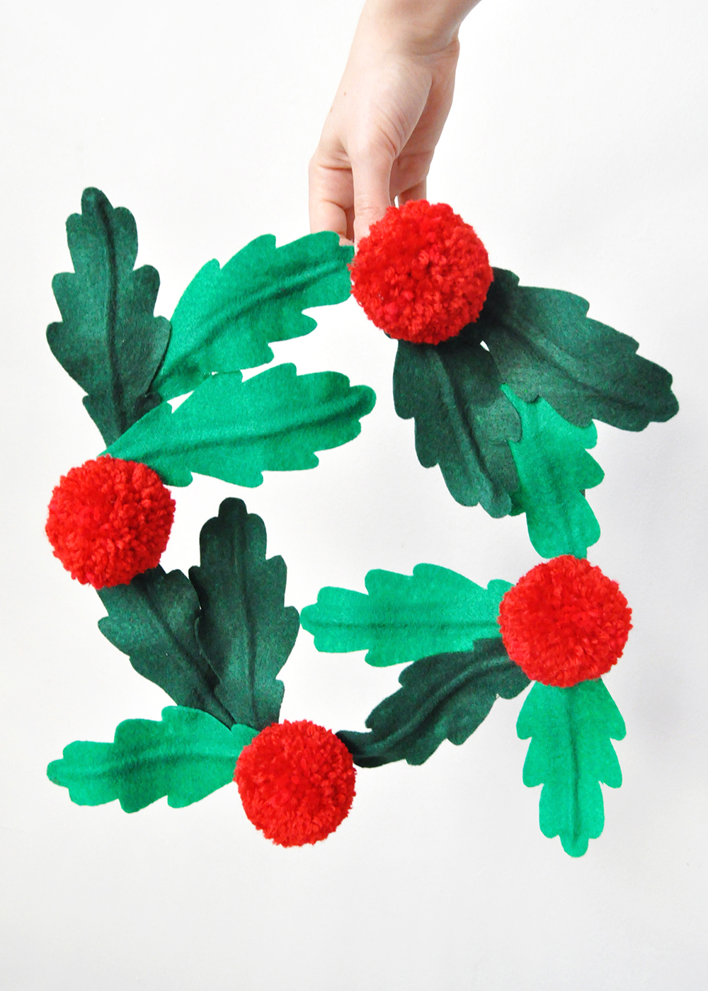 DIY felt and pom pom holly Christmas wreath