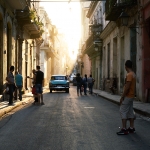 travel-to-cuba-playing-on-street
