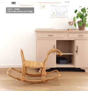 Rattan rocking horse in front of a