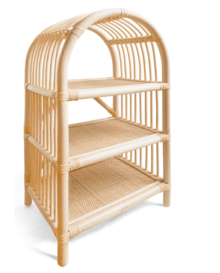 A rattan arch-shaped shelving unit with three shelves. 