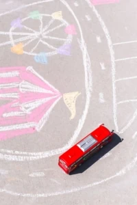 draw a city map for cars with sidewalk chalk