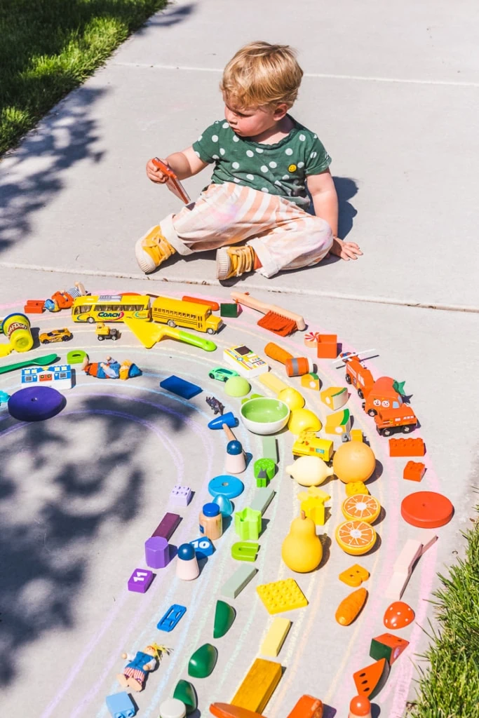 color match your toys to the rainbow with sidewalk chalk