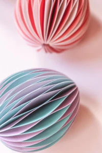 honeycomb Easter eggs on a blush pink background