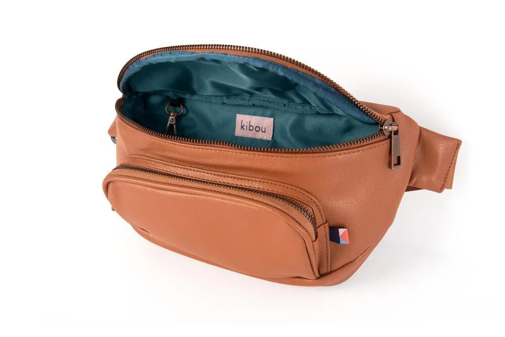 A warm brown fanny-pack style diaper bag. 