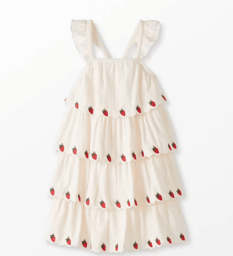 Tiered and ruffled white dress with embroidered strawberries