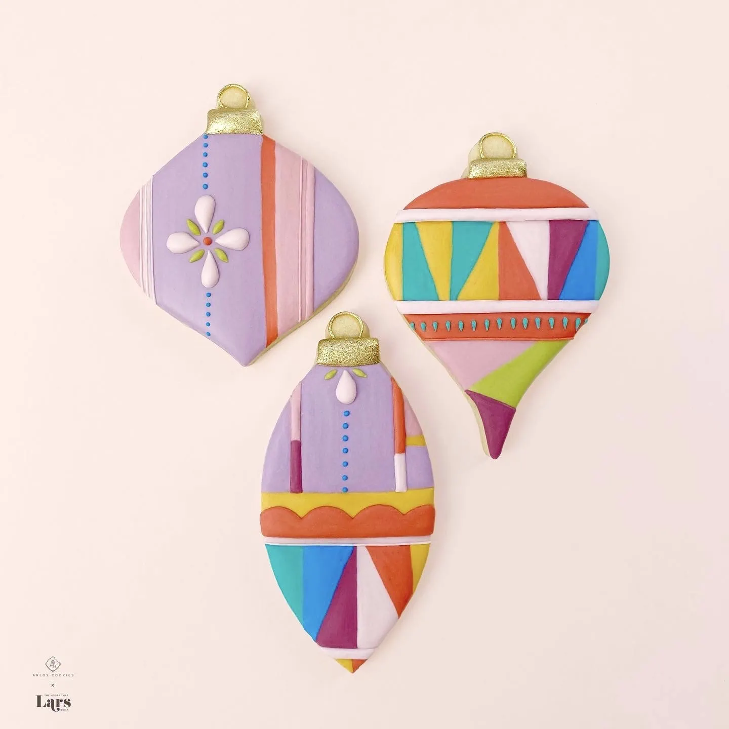 A collaboration between Arlos and Lars! Colorful geometric and floral patterns on ornament-shaped cookies.