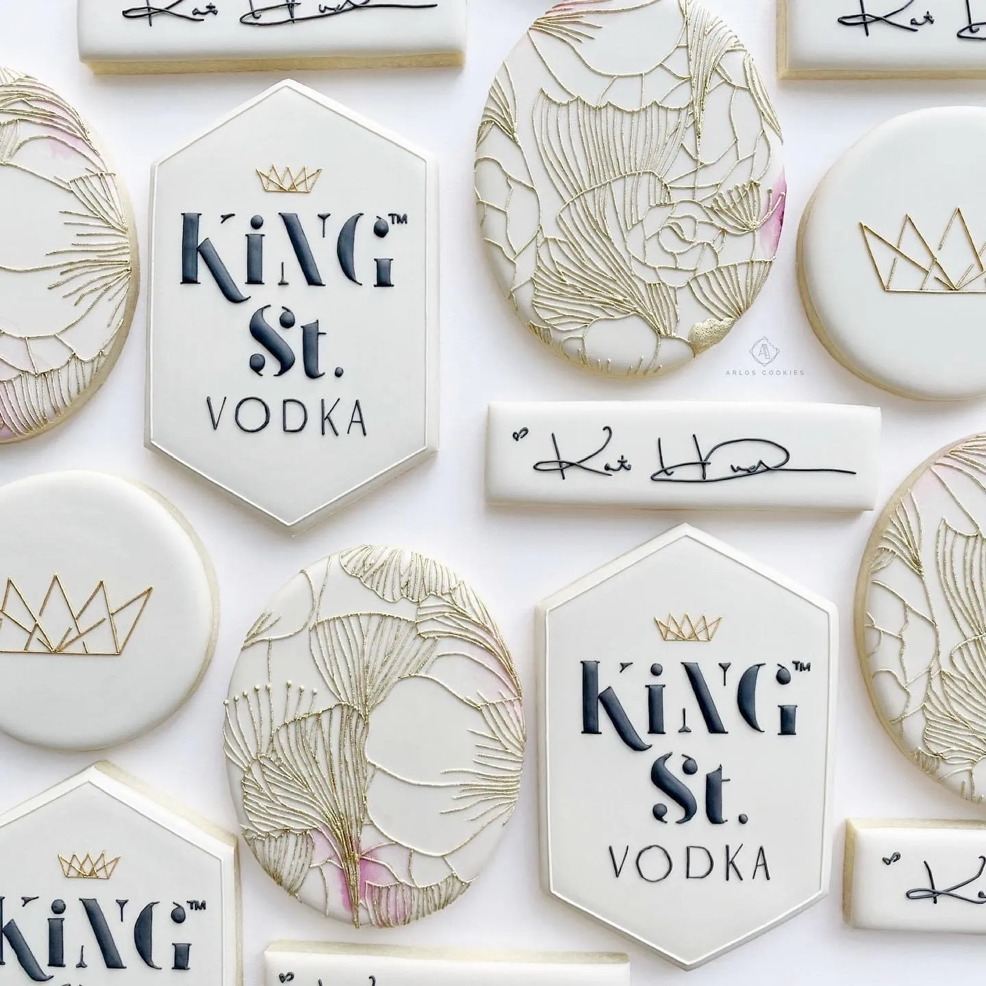 Cookies decorated with floral line drawings and the King St. Vodka logo