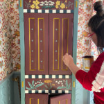 painting-dots-onto-cabinet
