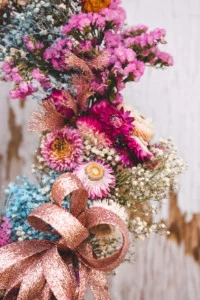 metallic ribbon on a dried flower wreath