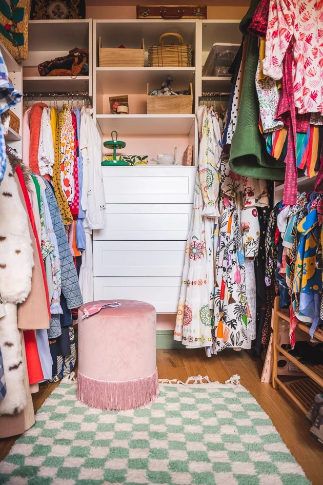 pink ottoman in closet