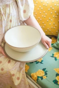 cream ceramic bowl and platter