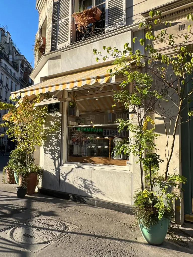 Parisian corner restaurant with yellow stripe awnings