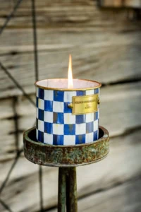 pretty citronella candle in blue and white checkerboard mackenzie childs